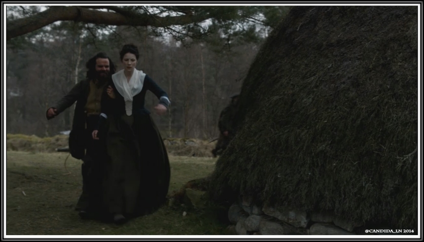 Angus (Stephen Walters) forces Claire (Caitrion Balfe) back to camp after finding her visiting with the village women.