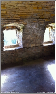 Possibly the windows in Jamie's room at the monastery.